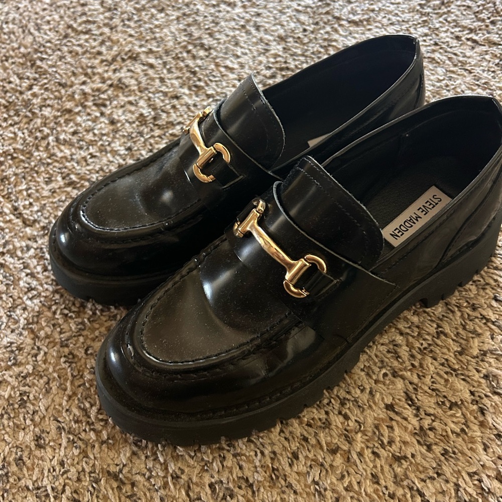 Steve Madden Glossy Black Loafers with Gold Accent